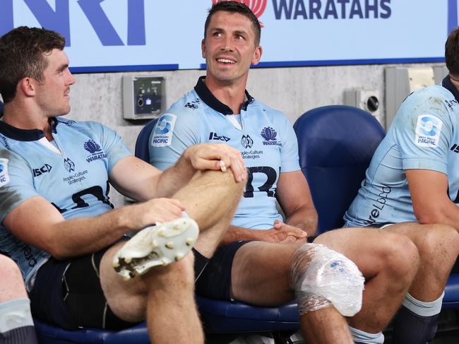 SYDNEY, AUSTRALIA - MARCH 08:  Jake Gordon of the Waratahs sits on the bench during the round four Super Rugby Pacific match between NSW Waratahs and Western Force at Allianz Stadium, on March 08, 2025, in Sydney, Australia. (Photo by Matt King/Getty Images)