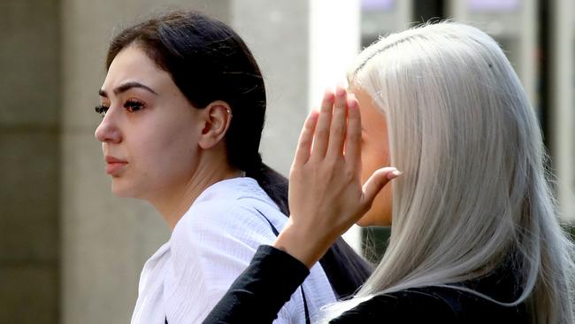 Alexandra Karanfilovski (right) and Israh Chahine leave Downing Centre Local Court. Picture: Toby Zerna