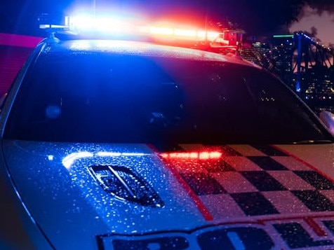 Generic picture of a Queensland Police car with lights flashing