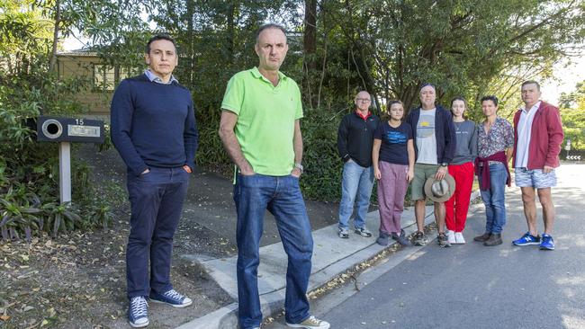 Cr Peter Matic (left) and resident Brenden Brien, with other Runic St residents opposed to a childcare centre proposed for their street. Picture: AAP/Richard Walker