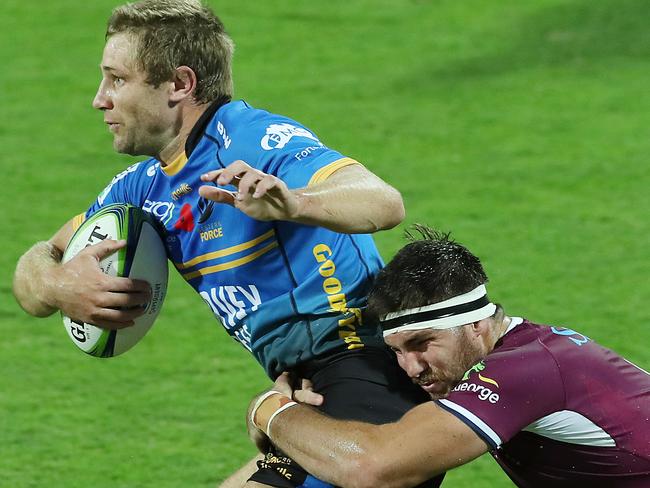 PERTH, AUSTRALIA - APRIL 23:  Kyle Godwin of the Force is tackled by Liam Wright of the Reds during the round 10 Super RugbyAU match between the Western Force and the Queensland Reds at HBF Park, on April 23, 2021, in Perth, Australia. (Photo by Will Russell/Getty Images)