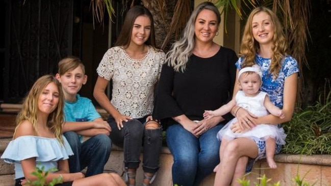 Dee-anne Allender, in black top, with her children Jewel, 13, Elliot, 9, Briallen, 17, Jessica, 21, and Jessica’s daughter, Aurora, eight months. Picture: Will Russell