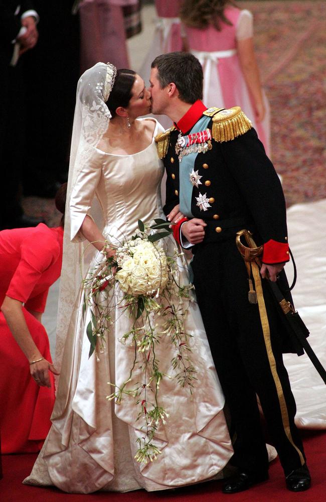 The loved-up pair seal it wth a kiss.