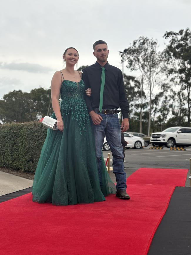 The students of Urangan State High School arriving at their formal.