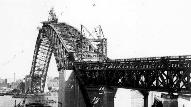 The Sydney Harbour Bridge was opened in 1932 (pictured under construction in 1930). Picture: Fox Photos/Getty Images