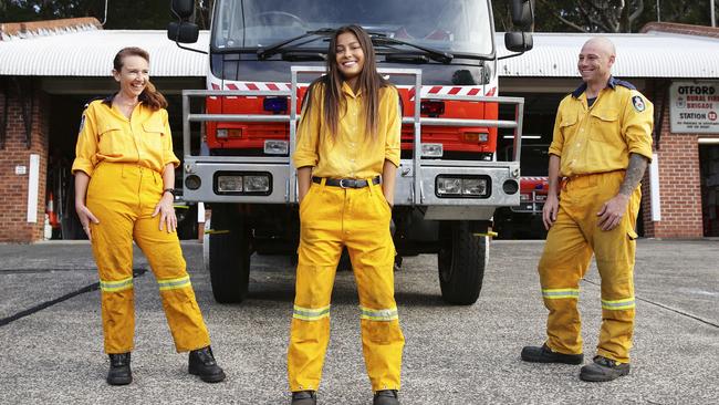 Otford Rural Fire Brigade's Jennie Gadd, Julia Newbery and Adam Mingare. Model Julia Newbery doubles as a volunteer firefighter for the Otford Fire Brigade unit. Picture: Justin Lloyd