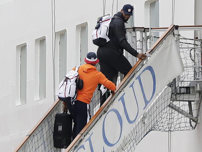 DeMarcus Cousins, right, and Carmelo Anthony board the Silver Cloud.