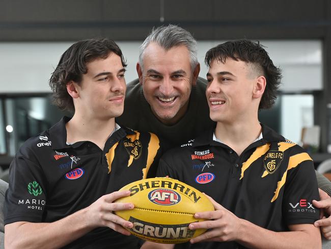 Former Blue Scott Camporeale with his twin boys and rising footy stars, Ben and Lucas. Picture: Keryn Stevens