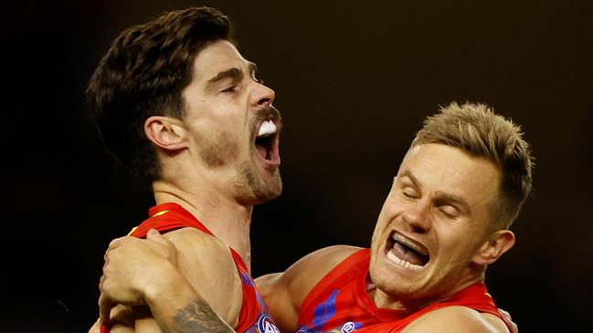 MELBOURNE, AUSTRALIA - JULY 01: Alex Sexton (left) and Brandon Ellis of the Suns celebrate during the 2021 AFL Round 16 match between the Gold Coast Suns and the Richmond Tigers at Marvel Stadium on July 01, 2021 in Melbourne, Australia. (Photo by Michael Willson/AFL Photos via Getty Images)