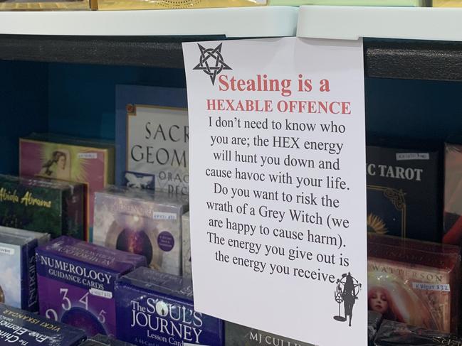 Signs on shelves inside 4C Sanctuary at Parabanks Shopping Centre warn people shoplifting is a hexable offence, but it has yet to deter people from inviting that negative energy into their lives. Picture: Tara Miko