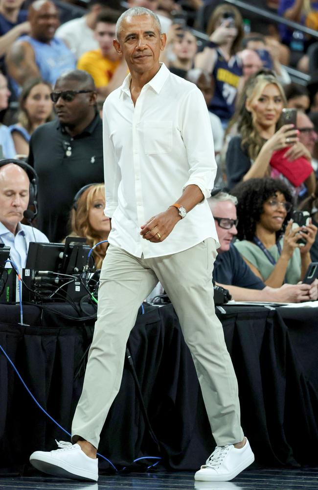 Mr Obama was in attendance at the exhibition match between the United States and Canada. Picture: Ethan Miller/Getty Images