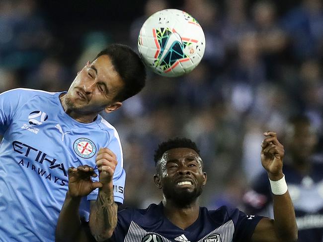 Adrian Luna of Melbourne City and Elvis Kamsoba of Melbourne Victory during the Round 1 A-League match between Melbourne Victory and Melbourne City FC at Marvel Stadium in Melbourne, Saturday, October 12, 2019. (AAP Image/George Salpigtidis) NO ARCHIVING, EDITORIAL USE ONLY