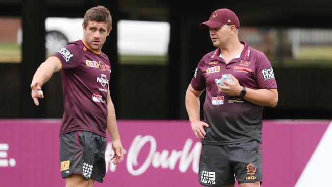 Andrew McCullough talks with Anthony Seibold during a Broncos training session. Picture: Peter Wallis