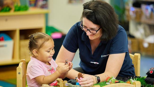 Educator Louise White with pre-kindy child Salaineah Miskin-Gaulai. Picture: Romy Photography