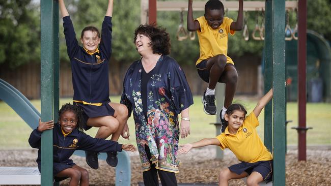 St James The Apostle Primary School principal Mary Abbott and pupils Mackayla, 9, Ariana, 12, Dimdel, 11 and Sanvi, 7. Picture: Alex Coppel