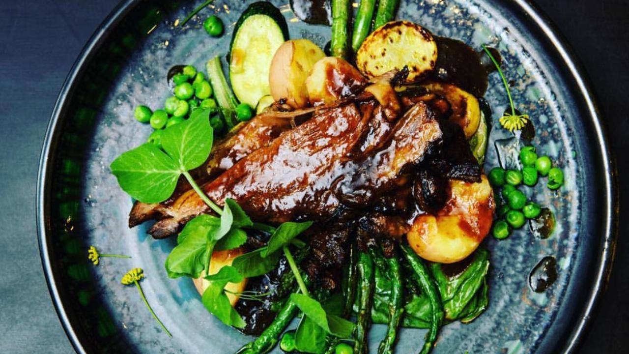 Warwick hogget shoulder slow cooked for 6 hours low and slow, with Cotswold Hills peas and cavallo nero, Bundaberg zucchini, young spindle asparagus and Cloud Lake fennel flowers.