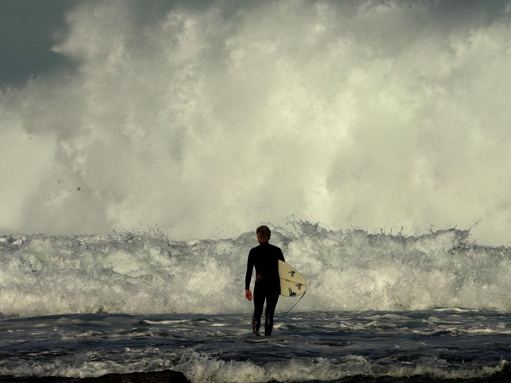 It was dangerous business for surfers trying to enter the rough surf at Merewether Beach in Newcastle. Picture: Peter Lorimer