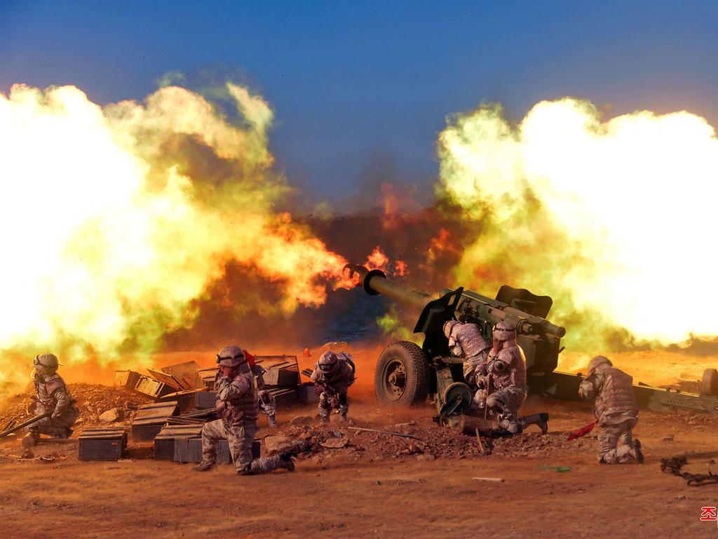 This picture released from North Korea's official Korean Central News Agency shows the North Korean People's Army frontline long-range artillery division and air force squadron during a fire attack training exercise, at an undisclosed location. Picture: AFP