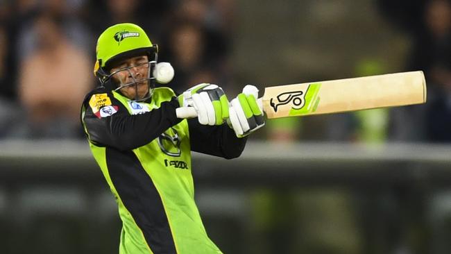 Osman Khawaja of the Sydney Thunder in action during the Big Bash League (BBL) match between Sydney Thunder and Hobart Hurricanes at Manuka Oval in Canberra, Saturday, February 9, 2019. (AAP Image/Lukas Coch) NO ARCHIVING, EDITORIAL USE ONLY, IMAGES TO BE USED FOR NEWS REPORTING PURPOSES ONLY, NO COMMERCIAL USE WHATSOEVER, NO USE IN BOOKS WITHOUT PRIOR WRITTEN CONSENT FROM AAP