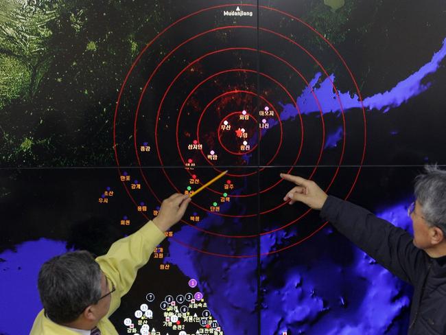 Geologists check the seismic waves from a previous North Korean bomb burst near Punggye-ri. Picture: Getty/AFP