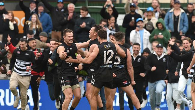 Port District’s Jason Nyskohus celebrates the grand final win with Jack Gaffney and the ecstatic crowd after the siren. Picture: Tricia Watkinson