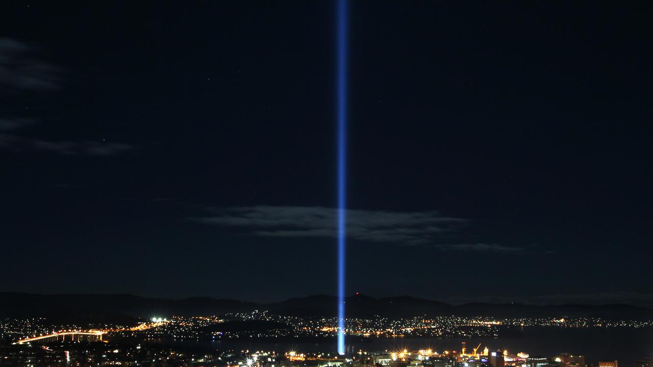 Dark MOFO event. The last night of Ryoji Ikeda's light installation being beamed from the Domain in Hobart. Viewed from West Hobart. Picture: Nikki Davis-Jones