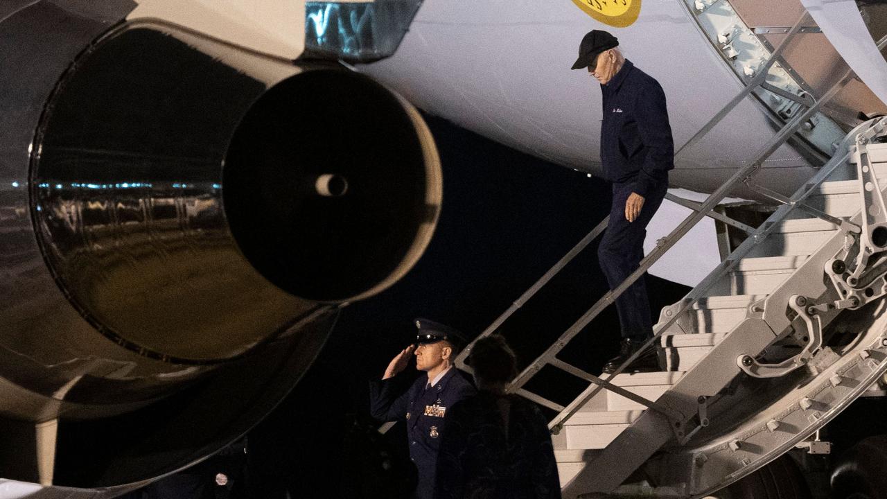 The President disembarking in Delaware, where he will self-isolate during his infectious period. Picture: Chris Kleponis/AFP