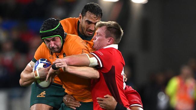 Wallabies lock Nick Frost takes on the Wales defence. Picture: Getty Images