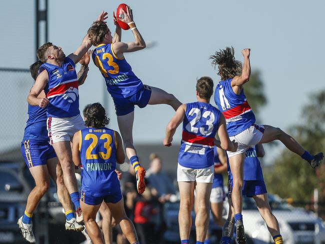 Mitchell Tharle takes a big mark for Cranbourne against Wandin at Livingston Reserve on Saturday. Picture: Valeriu Campan