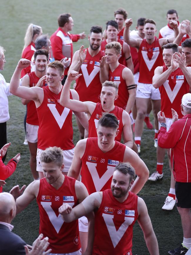 North Adelaide players celebrate after beating the Eagles. Picture Sarah Reed