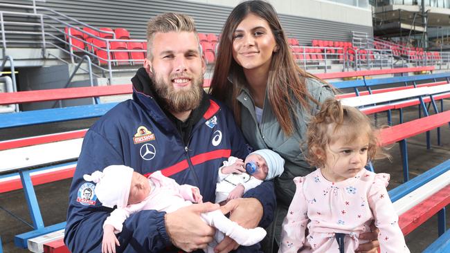 Western Bulldogs recruit Jackson Trengove with his twins, Isaiah and Zalia, partner Stephanie Mustica and daughter Sophia. Picture: David Crosling