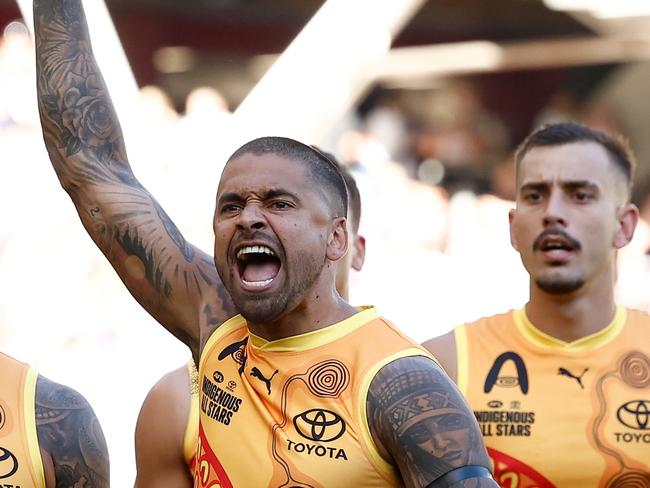 PERTH, AUSTRALIA - FEBRUARY 15: Bradley Hill of the All Stars leads the war cry during the 2025 Toyota AFL Indigenous All Stars match between the Indigenous All Stars and the Fremantle Dockers at Optus Stadium on February 15, 2025 in Perth, Australia. (Photo by Michael Willson/AFL Photos via Getty Images)