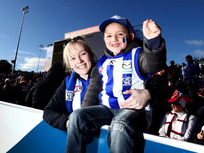 Samuel Golding, 5, of Dodges Ferry ready to support North Melbourne today with his stepmother, Melanie Bennett, also of Dodges Ferry.