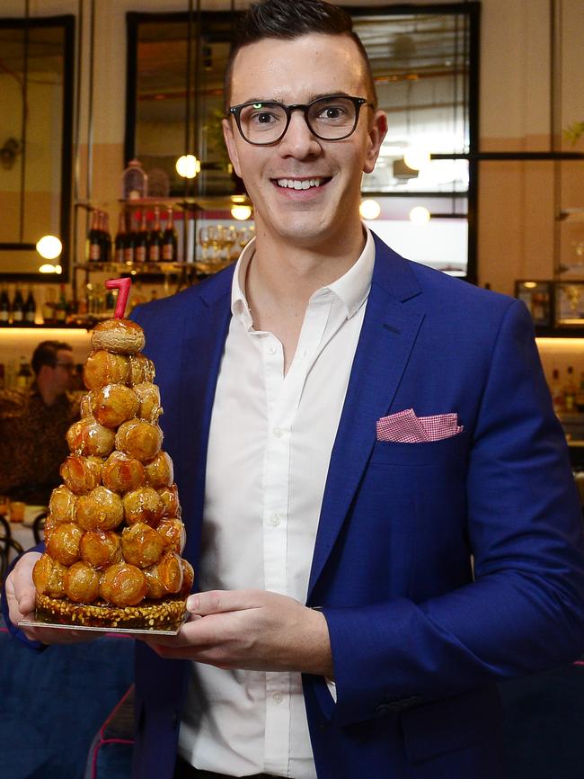 Port Melbourne’s Ashley Glasic with one of Zumbo’s most famous desserts, the crochembouche. Picture: Stephen Harman