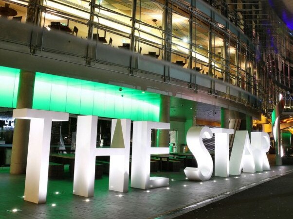 The Star casino, operated by Echo Entertainment Group Ltd., stands illuminated at night in Sydney, Australia, on Monday, Aug. 10, 2015. Echo Entertainment is scheduled to report full-year results on Aug. 12. Photographer: Brendon Thorne/Bloomberg