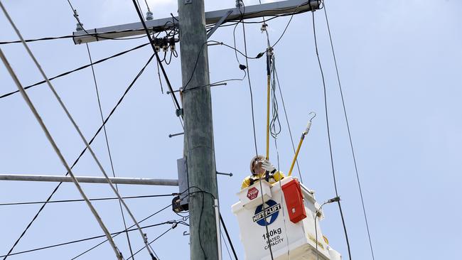 What is the pole called which holds up power lines? (Image/Josh Woning)