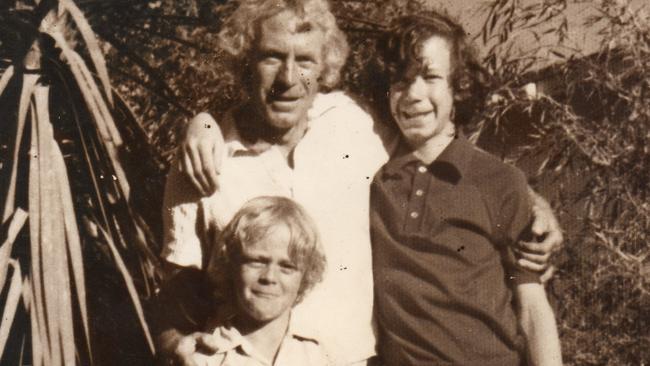 Greg Cowie (front) with his family before his death.