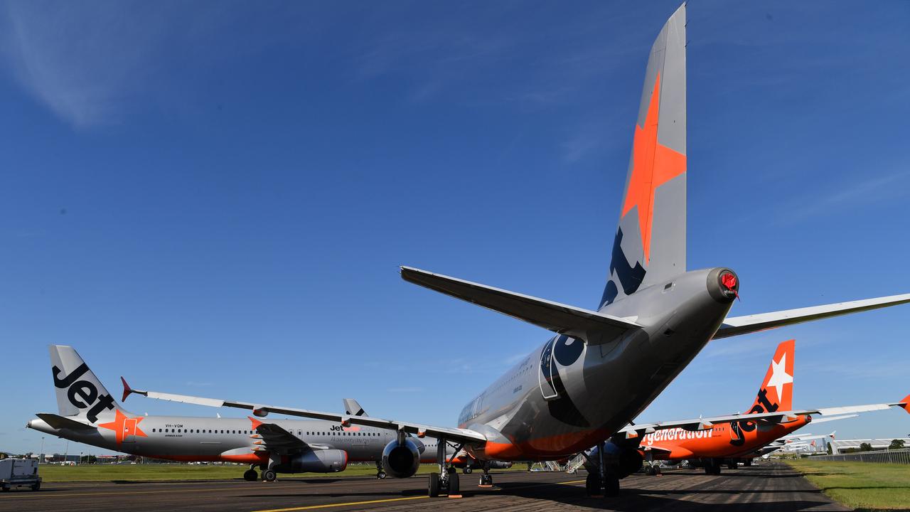 Grounded Jetstar aircraft parked at Brisbane Airport. Picture: Darren England/AAP