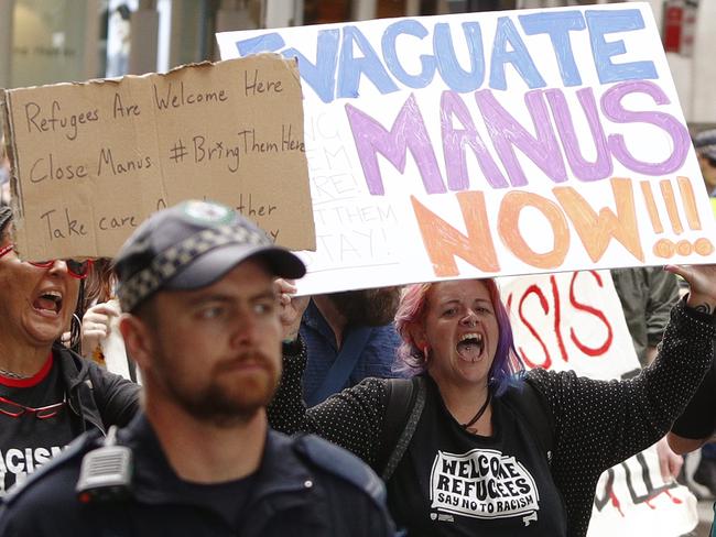 Hundreds of people marched the streets in support of Manus Island refugees during a rally at Hyde Park, Sydney in November. Picture: AFP
