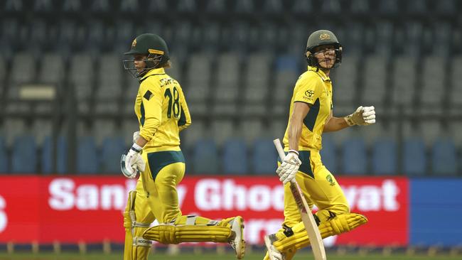 Phoebe Litchfield (left) and Ellyse Perry put on 148 for the second wicket as Australia chased down India’s 8-282 at Wankhede Stadium in Mumbai. Picture: Pankaj Nangia / Getty Images