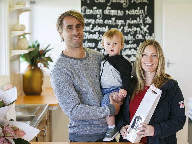 MANLY DAILY AAP Photo (L to R) Brad Rowan, son Riley & Elke Dupere Rowanson at the 122 Parkes Rd Collaroy Plateau on Saturday the 11th May 2019.The young couple won the auction.0404 063 500 (Elke Mobile)0404 600  587 (Brad Mobile)Old home held in same family since 1962 has had lots of interest with 140 groups inspecting it.AAP IMAGE/ Tim Pascoe