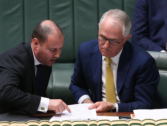 Minister for Environment and Energy Josh Frydenberg and Malcolm Turnbull in Question Time. Picture: Kym Smith