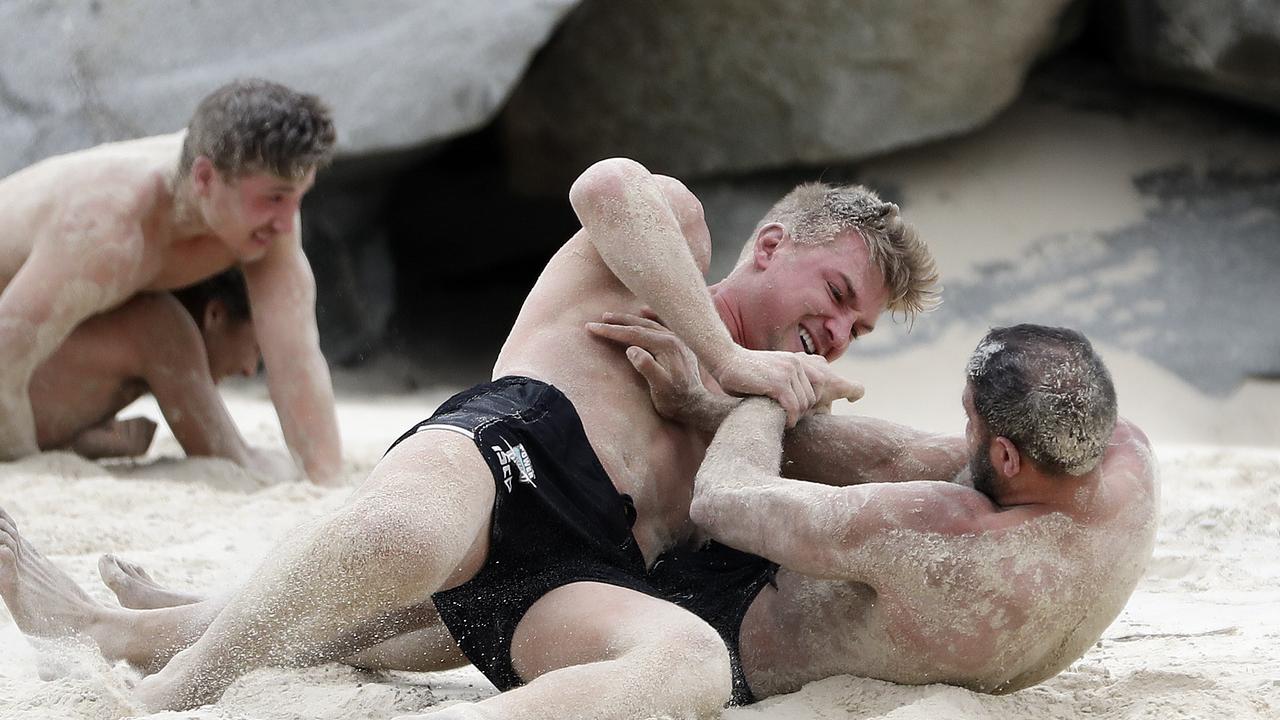 Ollie Wines grapples with Paddy Ryder during Port Adelaide’s pre-season camp at Noosa in December. Picture: Sarah Reed