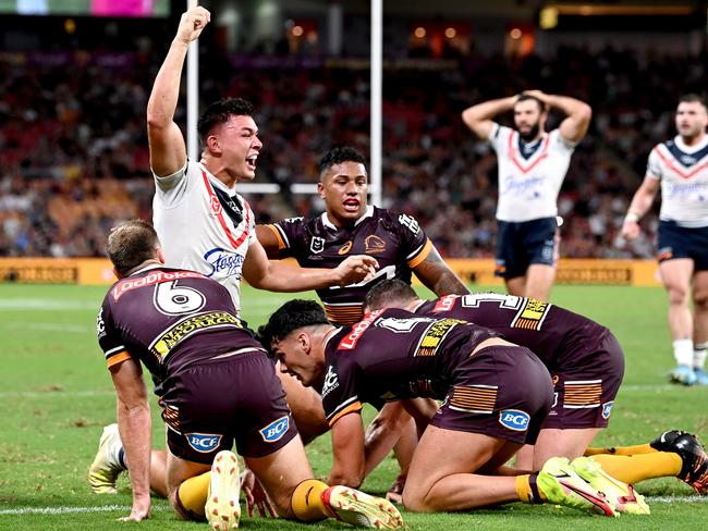 Joey Manu of the Roosters celebrates scoring a try. Picture: Bradley Kanaris/Getty Images