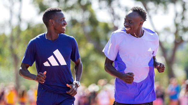 Peter Bol and Gout Gout training in Melbourne. Picture: Mark Stewart