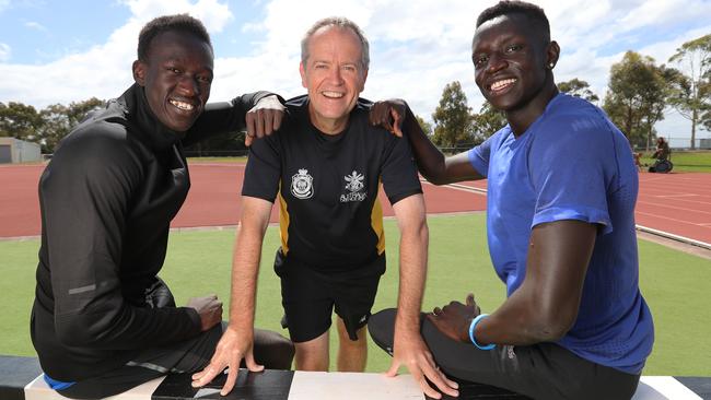 Joseph Deng, Peter Bol and Bill Shorten in Melbourne. Picture: Alex Coppel