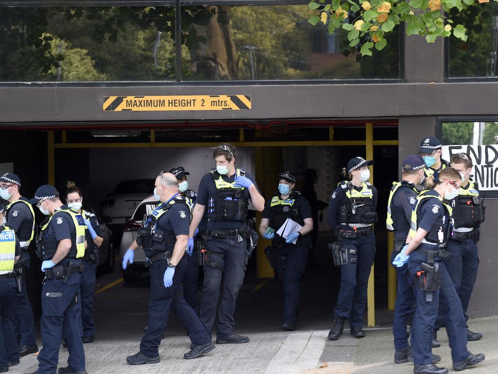 Police form a cordon outside the Park Hotel Immigration detention facility in Carlton where Novak Djokovic is being detained. Picture: NCA NewsWire / Andrew Henshaw