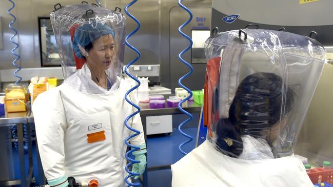 WUHAN, CHINA - FEBRUARY 23 2017: Virologist Shi Zheng-li, left, works with her colleague in the P4 lab of Wuhan Institute of Virology (WIV) in Wuhan in central China's Hubei province Thursday, Feb. 23, 2017.- PHOTOGRAPH BY Feature China / Future Publishing (Photo credit should read Feature China/Future Publishing via Getty Images)