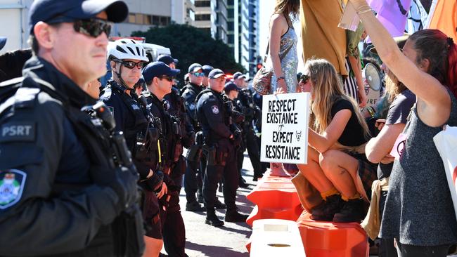 Extinction Rebellion protesters face off with police. Picture: AAP