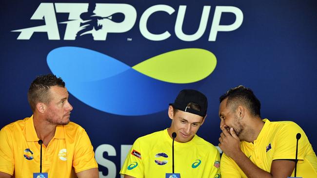 Nick Kyrgios (R) jokes with Alex de Minaur (C). Picture: Saeed Khan/AFP